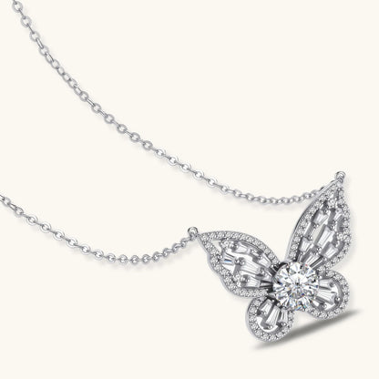 Sterling silver butterfly pendant with radiating design and central moissanite stone on adjustable chain