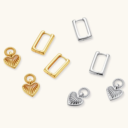 Platinum-plated 925 sterling silver rectangular hoop earrings with twisted ring connector and ribbed heart charm pendant.